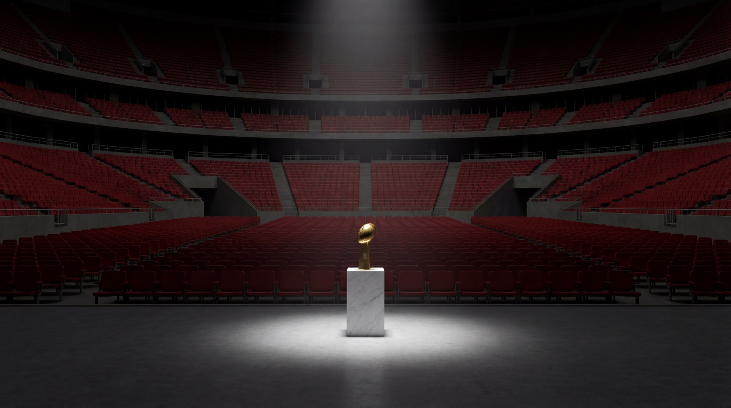 Trophy spotlit in an empty stadium